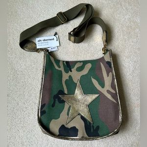 Ahdorned canvas crossbody / messenger bag NWT. Green camo with gold star.